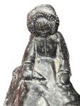 Inuit Soapstone Carving: Man Feeding Seal Fish