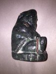 Inuit Woman Carving in Parka with Flowers