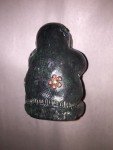 Inuit Woman Carving in Parka with Flowers