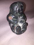 Inuit Woman Carving in Parka with Flowers