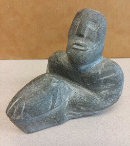 Inuit Soapstone Carving: Man Holding Rock