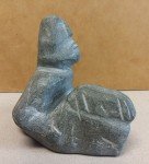 Inuit Soapstone Carving: Man Holding Rock