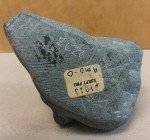 Inuit Soapstone Carving: Man Holding Rock