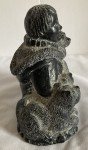 Wolf Sculpture: Inuit Man with Wolf Pups