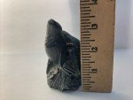 Hand-Carved Soapstone Wolf Sculpture on Rock