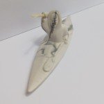 Inuit Art Carving: Kayak with Harpoon Design