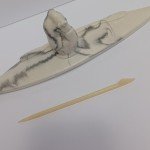 Inuit Art Carving: Kayak with Harpoon Design
