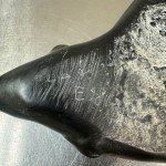Inuit Art Soapstone Crossed Seals Figurine