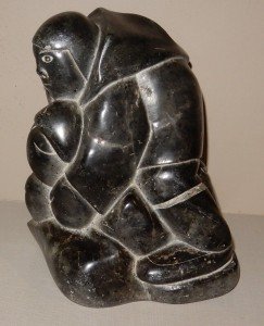 Inuit Stone Hunter with Seal Carving - 8" Tall