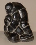 Inuit Stone Hunter with Seal Carving - 8" Tall