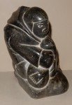 Inuit Stone Hunter with Seal Carving - 8" Tall