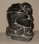Inuit Stone Hunter with Seal Carving - 8" Tall