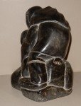Inuit Stone Hunter with Seal Carving - 8" Tall