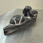 Inuit Stone Carving: Man in Canoe with Seal