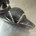 Inuit Stone Carving: Man in Canoe with Seal