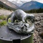 Handcrafted Inuit Stone Sculpture: Signed Wolverine with Salmon