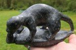 Handcrafted Inuit Stone Sculpture: Signed Wolverine with Salmon