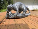 Handcrafted Inuit Stone Sculpture: Signed Wolverine with Salmon