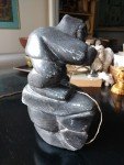 Hand-Carved Inuit Hunter with Walrus Sculpture