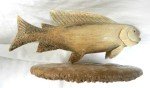 Inuit Carved Fish on Whalebone Disc Sculpture