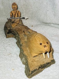 Inuit Wood Carving: Hunter with Seal Sculpture