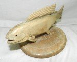 Inuit Carved Fish on Whalebone Disc Sculpture