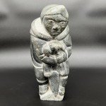 Inuit Soapstone Hunter with Sea Otter Sculpture