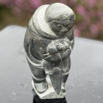 Inuit Soapstone Hunter with Sea Otter Sculpture