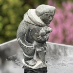 Inuit Soapstone Hunter with Sea Otter Sculpture