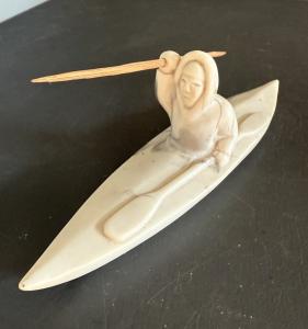 Eskimo in Kayak Carving with Harpoon