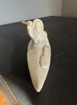 Eskimo in Kayak Carving with Harpoon