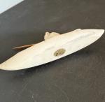 Eskimo in Kayak Carving with Harpoon