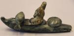 Inuit Soapstone Carving: Man in Kayak and Seal