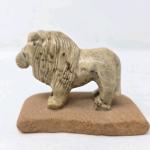 Hand Carved Lion Figurine with Sandstone Base