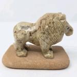 Hand Carved Lion Figurine with Sandstone Base