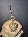 Stone Carved Face with Brass Frog Decoration