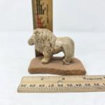 Hand Carved Lion Figurine with Sandstone Base