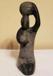 Hand-Carved Inuit Stone Sculpture of Woman with Baskets