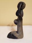 Hand-Carved Inuit Stone Sculpture of Woman with Baskets