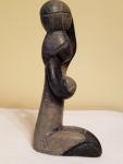 Hand-Carved Inuit Stone Sculpture of Woman with Baskets
