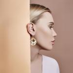 Inukshuk Copper Hoop Earrings with Sunburst Design