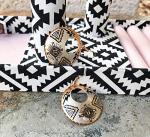 Inukshuk Copper Hoop Earrings with Sunburst Design