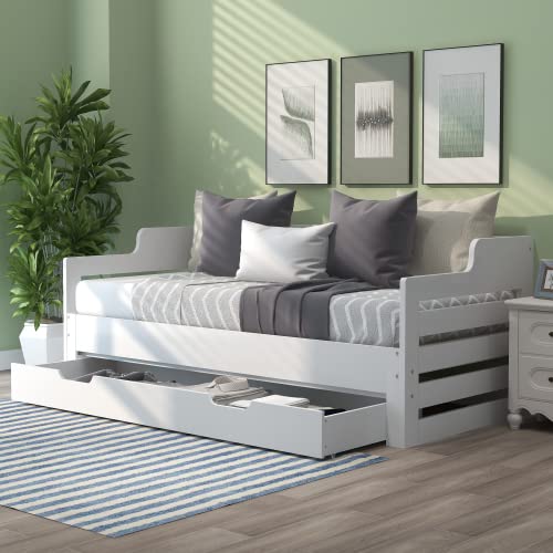 White wooden daybed with trundle and storage drawer
