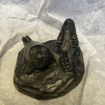 Al Wolf Soapstone Otter and Seal Carvings