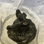 Al Wolf Soapstone Otter and Seal Carvings