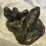 Al Wolf Soapstone Otter and Seal Carvings