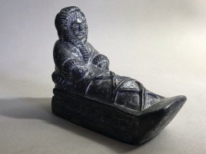 Mini Soapstone Eskimo on Sled by Al Wolf