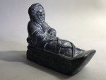 Mini Soapstone Eskimo on Sled by Al Wolf