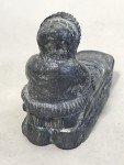 Mini Soapstone Eskimo on Sled by Al Wolf