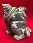 Inuit Soapstone Carving: Man and Seal Design